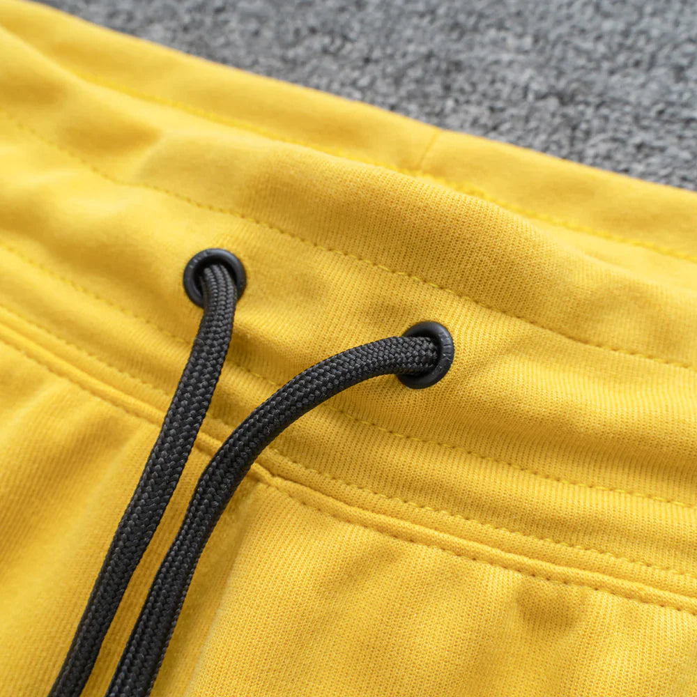 Conjunto NK Tech Fleece Amarelo