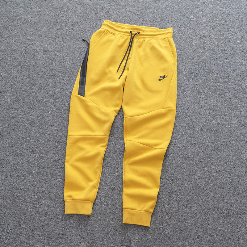 Calça NK Tech Fleece Amarelo