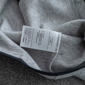 Jaqueta NK Tech Fleece Cinza