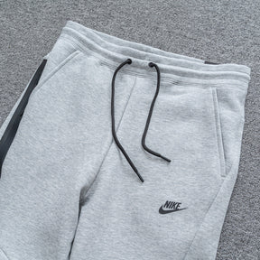 Calça NK Tech Fleece Cinza