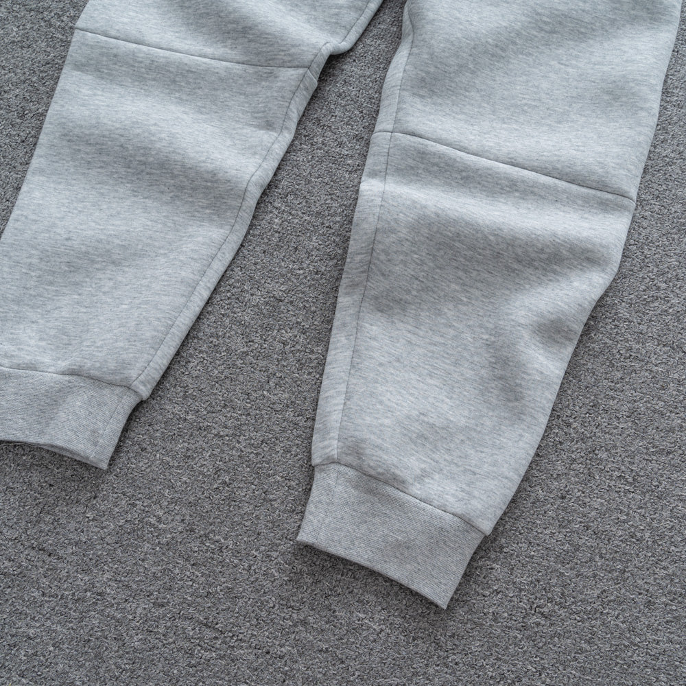 Calça NK Tech Fleece Cinza