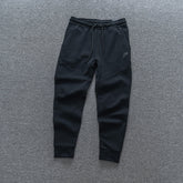 Calça NK Tech Fleece